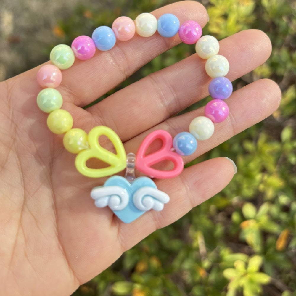 Buntes Armband mit Blumenanhängern Karnz