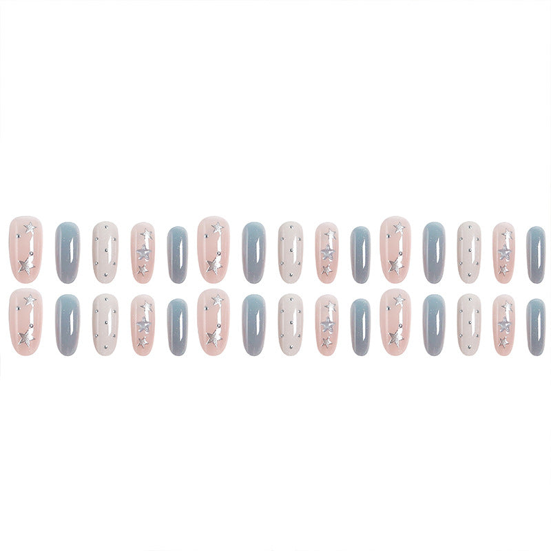 Kunstnagelset mit funkelnden Sternenmotiven Karnz