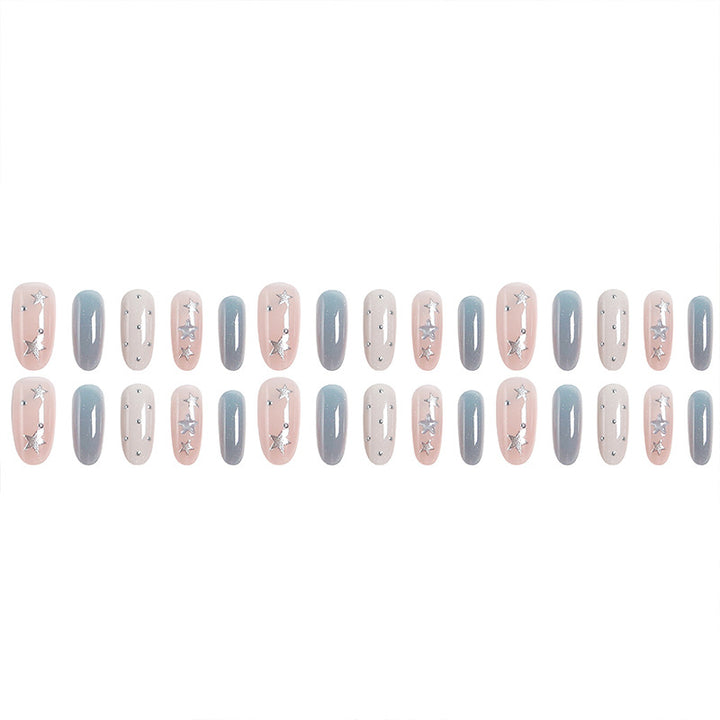 Kunstnagelset mit funkelnden Sternenmotiven Karnz