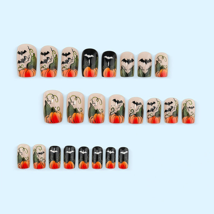 Kunstnägel im Halloween-Design mit Kürbissen und Geistern Karnz