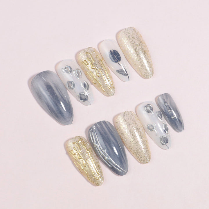 Künstlerisches Stiletto Presse-auf-Nageldesign mit zeitgenössischen Akzenten Karnz