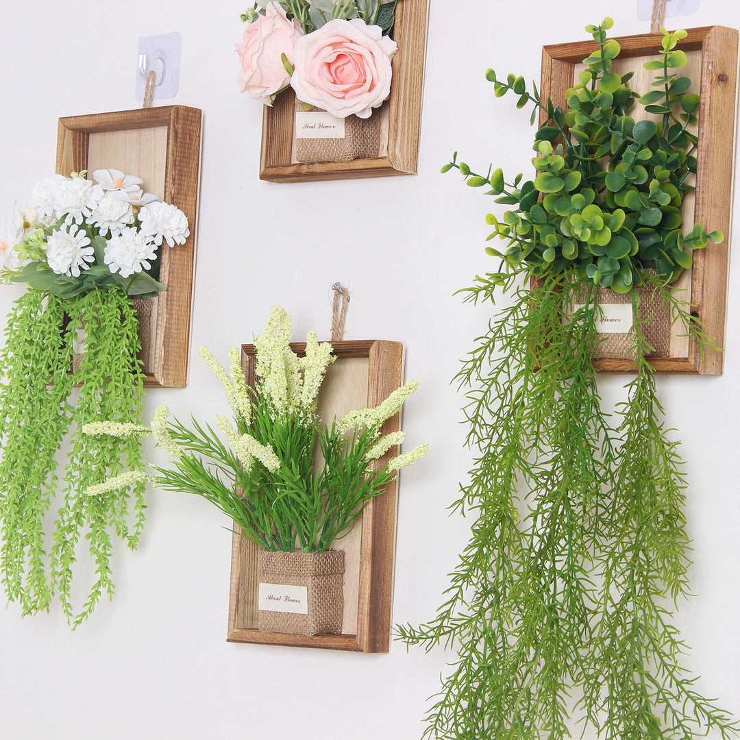 Wandmontierte dekorative florale hängende Pflanzgefäß