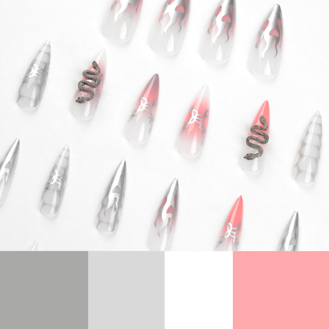 Kunstvolle Stiletto-Nägel mit Schlangen-Motiv Karnz