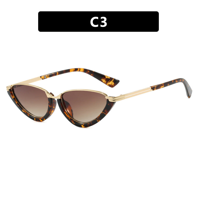 Damen futuristische Cat-Eye Sonnenbrille mit goldenen Akzenten Karnz
