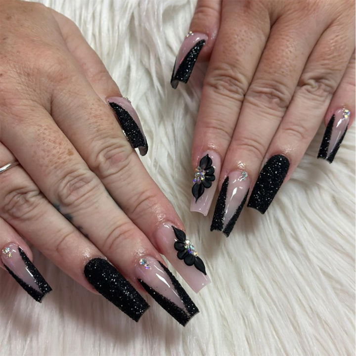 Glamouröse Lange Stiletto Press-On Nägel mit Glitzer und Blütenakzenten Karnz