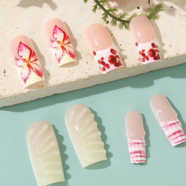 Kunstnägel Set mit eleganten floralen Designs Karnz