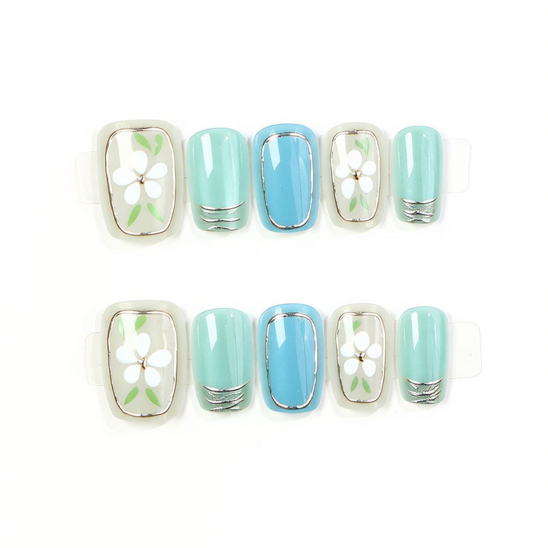 Dekoratives Press-On Nagelset mit floralen Akzenten Karnz