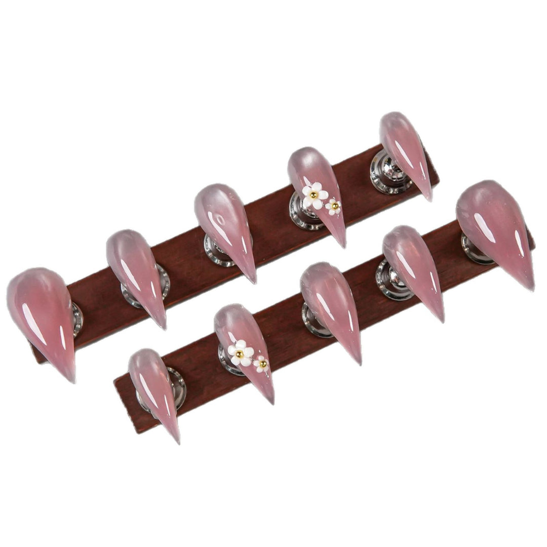 Elegantes Stiletto Press-On Nagelset mit Blumenverzierungen