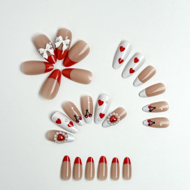 Kreative Nagelkunst mit Herz-und Kirschmotiven Karnz