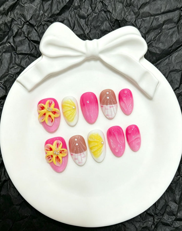 Dekorativer Press-On-Nagelsatz mit floralem und Ombré-Design