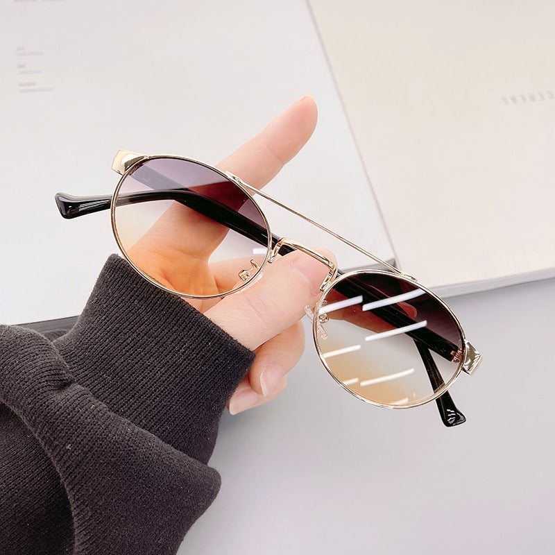 Damen modische Sonnenbrille im stilvollen runden Design mit goldenen Akzenten Karnz