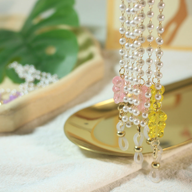 Elegantes Perlenbrillenband Karnz