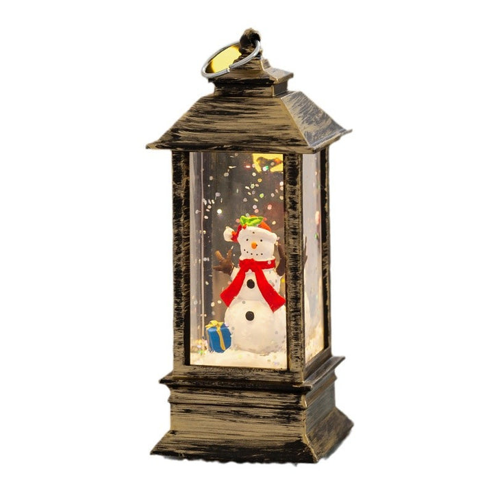 Weihnachtslaterne mit LED-Beleuchtung und dekorativem Schneeeffekt
