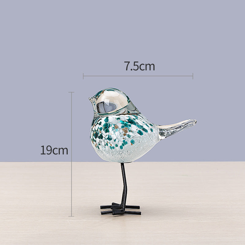 Handgefertigte dekorative Glasskulptur eines Vogels auf Metallbeinen Karnz