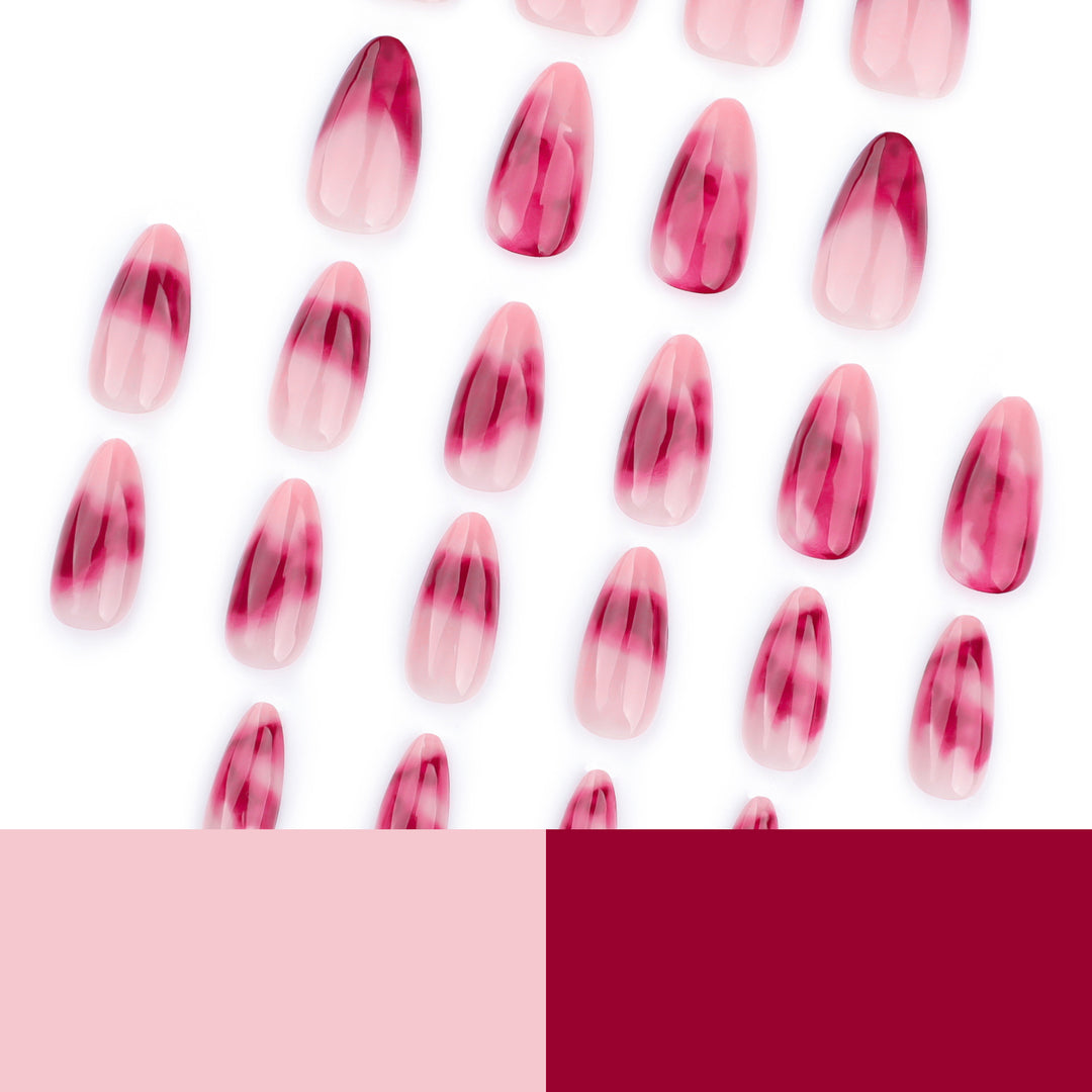 Kunstvolle Stiletto-Nägel mit glamourösem Farbverlauf Karnz