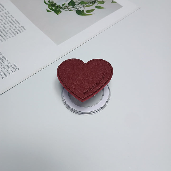 Herzförmiger Telefonhalter Karnz