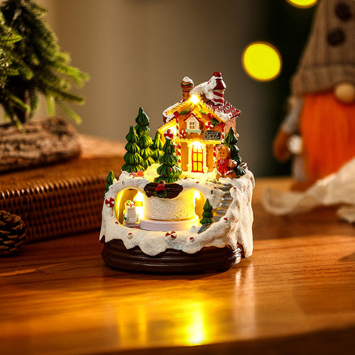 Beleuchtete Weihnachtsdorf-Szene mit winterlichem Design Karnz