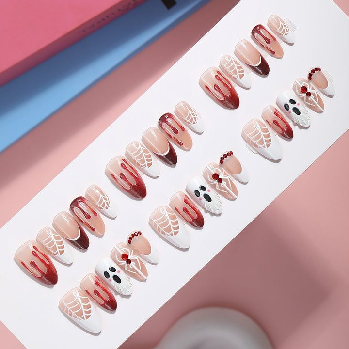 Kreatives Kunstnagelset mit Halloween-Motiven und Glitzerelementen Karnz