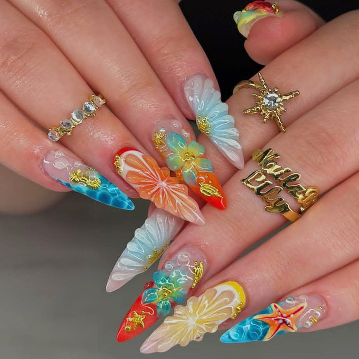 Künstlerisches floral und ozeanisches Press-On Nagelkunstset Karnz