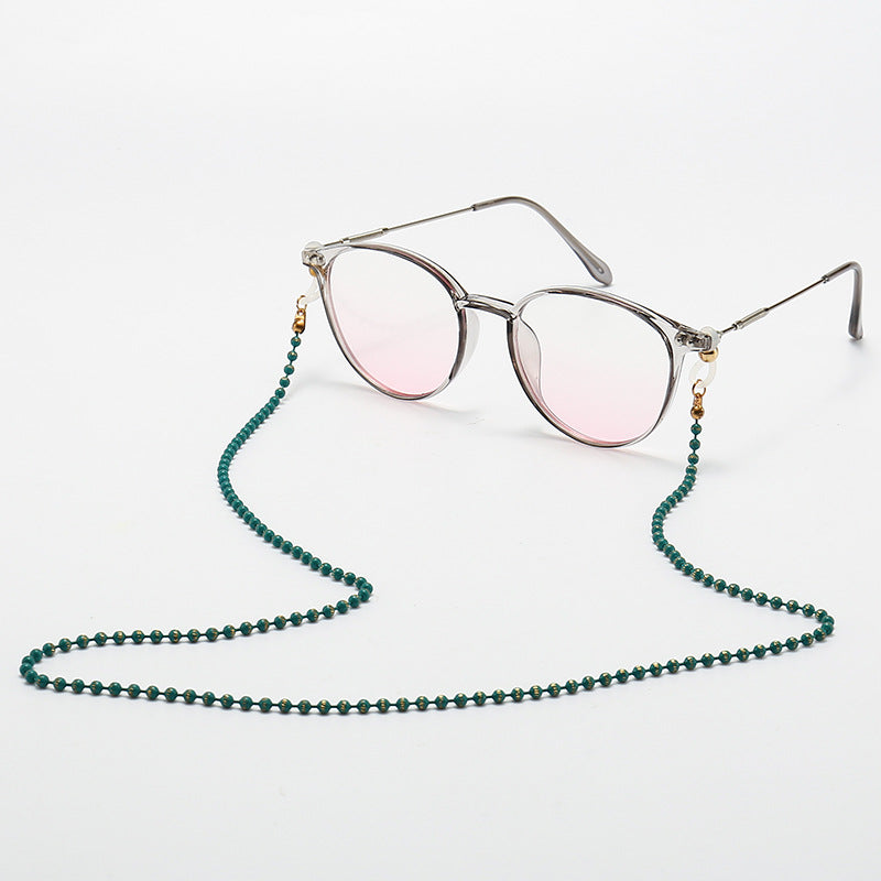 Modische Katzenaugenbrille mit Perlenkette Karnz