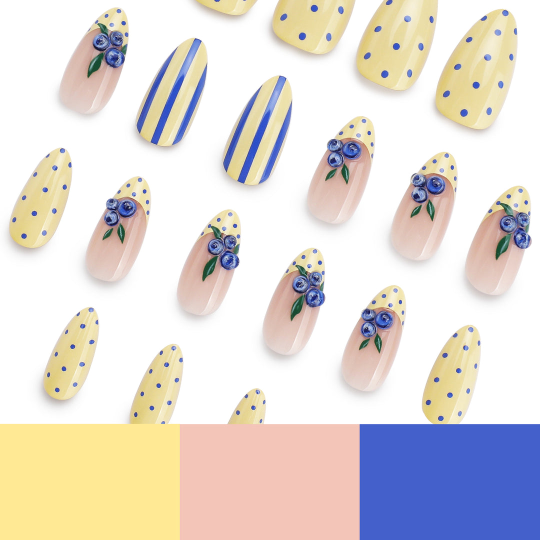 Kunstvolle Stiletto-Nägel mit floralen Akzenten und bunten Mustern Karnz