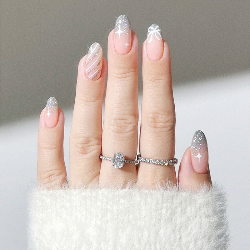 Dekorativer Press-On-Nagelset mit Glitzer und gestreiftem Design Karnz