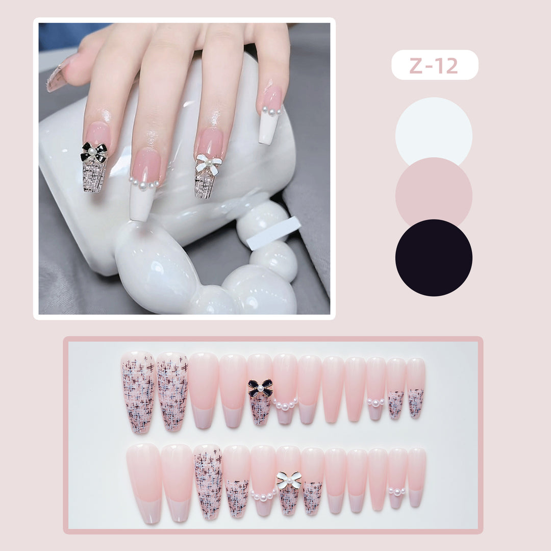 Elegante Press-On Nagelkunst mit dekorativen Schleifenakzenten