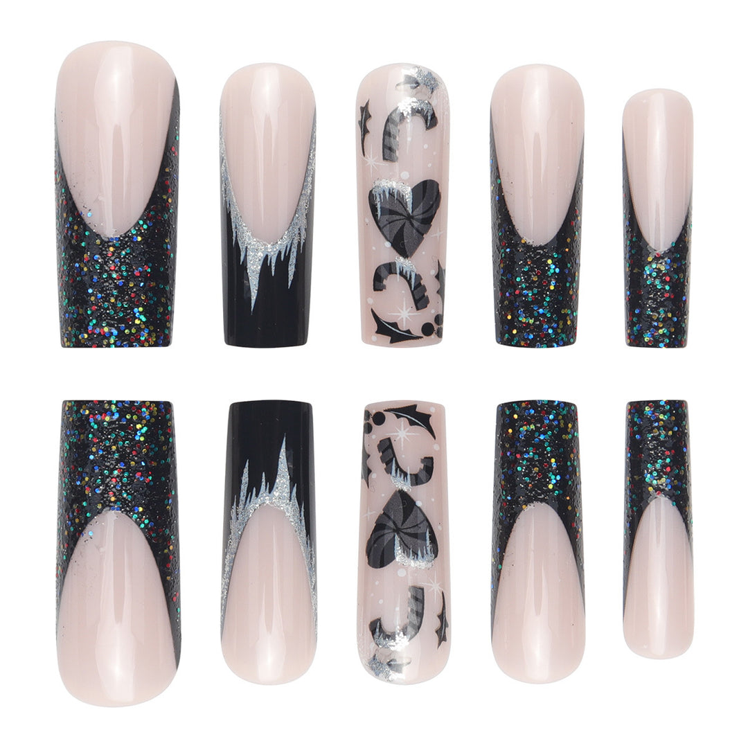 Künstlerisches Langes Stiletto Press-On-Nagelset mit Glitzer und Grafikdesign Karnz