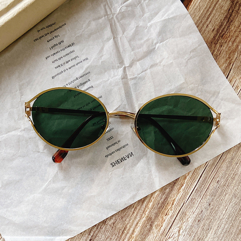Runde Sonnenbrille mit Goldenen Akzenten Karnz