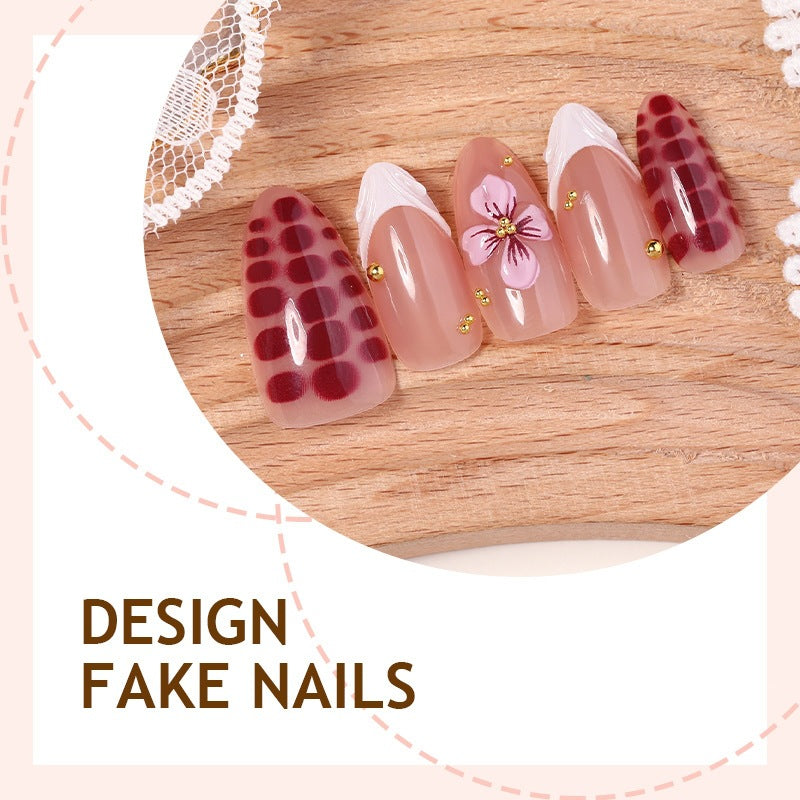 Kunstnagelset mit aufregenden Blumen- und Glitzermotiven Karnz