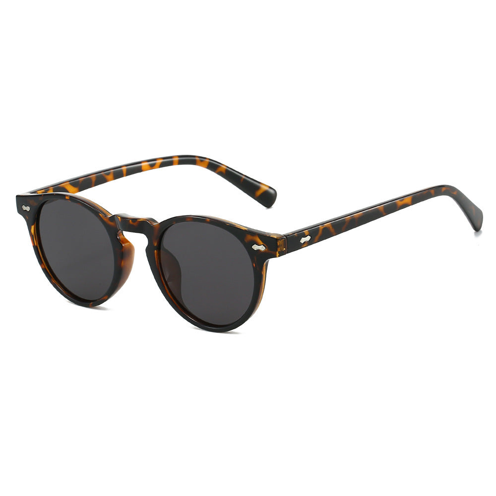 Damen Vintage Sonnenbrille mit runden Gläsern und transparentem Rahmen Karnz