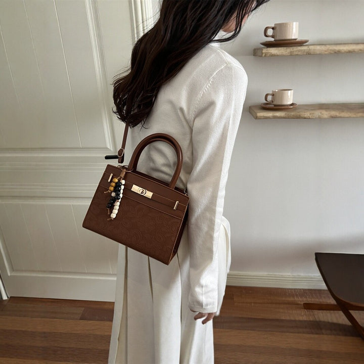 Elegante geprägte Handtasche