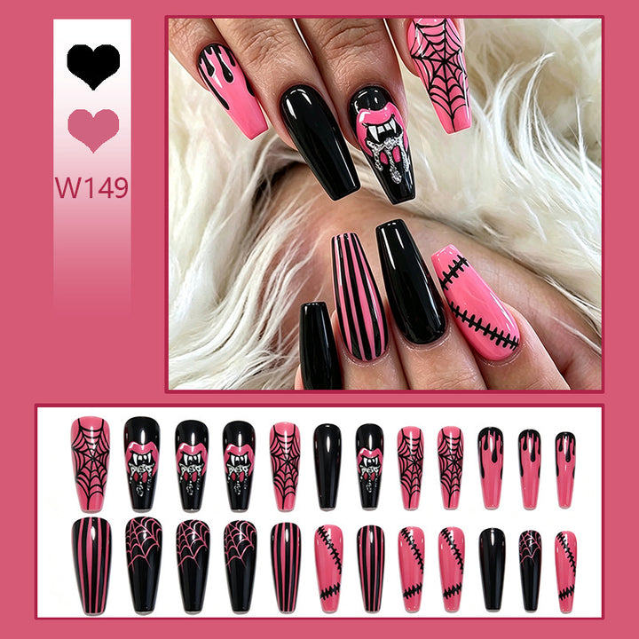 Kreatives Kunstnagelset mit Halloween-Motiven und funkelnden Applikationen Karnz