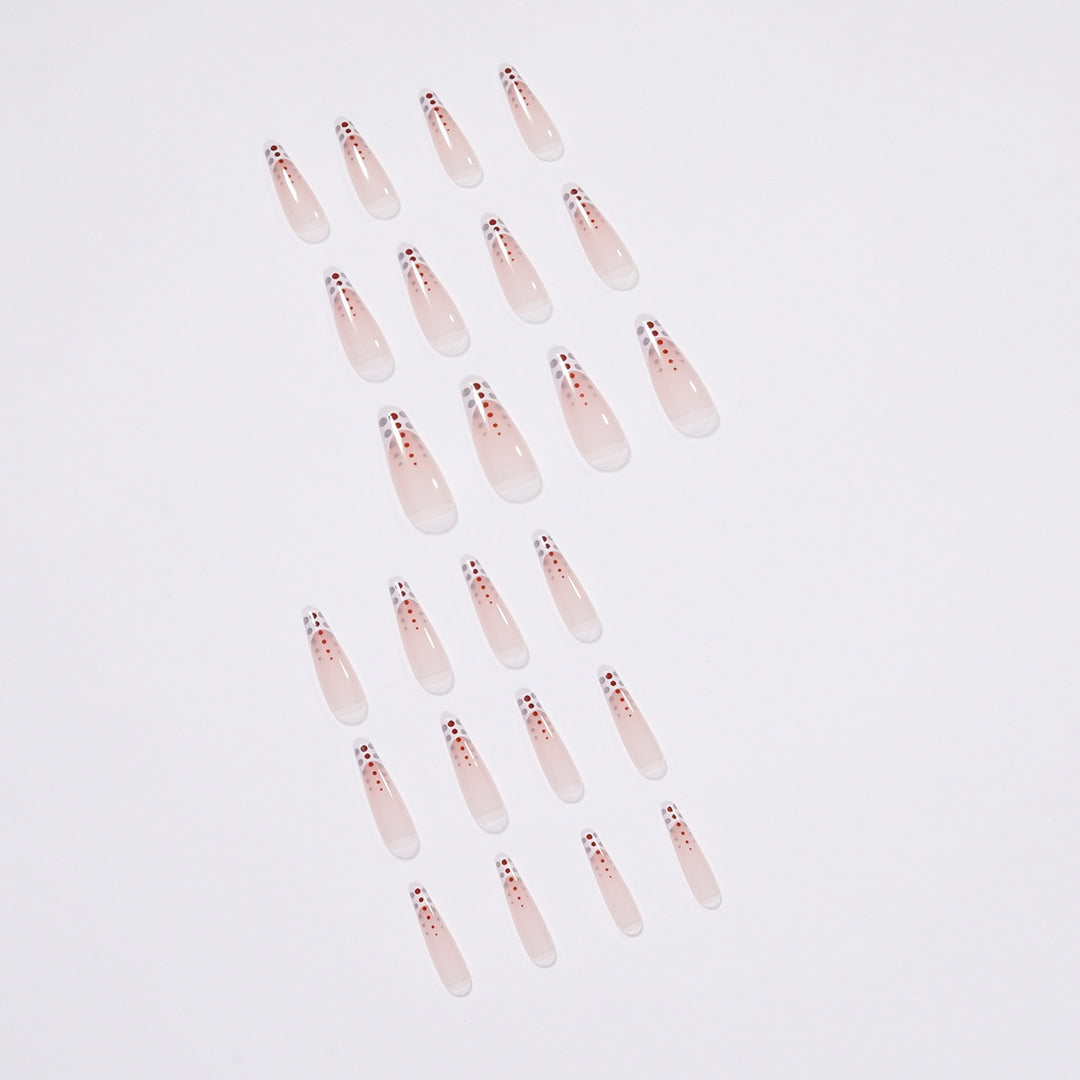 Kunstvolle Nagelverlängerungen mit eleganten Dots und schimmerndem Ombré Karnz