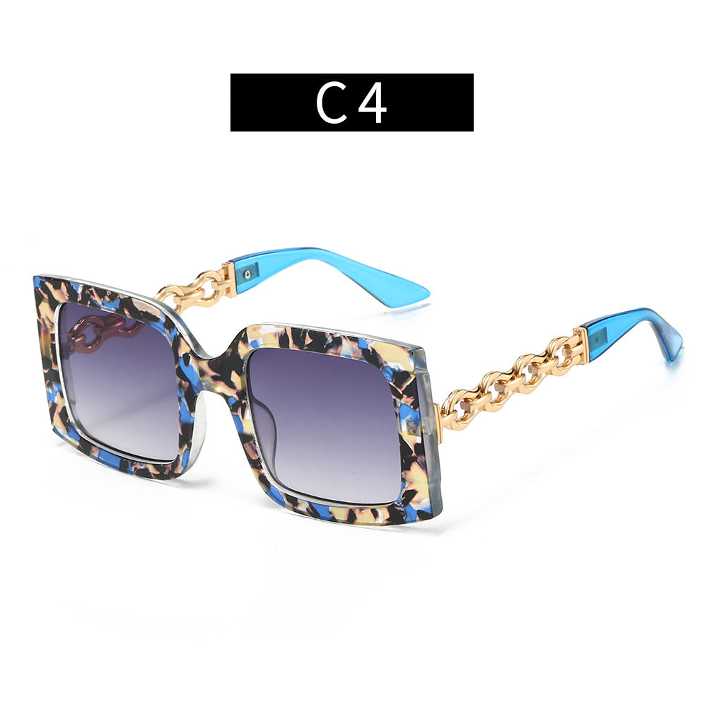 Damen elegante Sonnenbrille mit luxuriösen Kettendetails Karnz