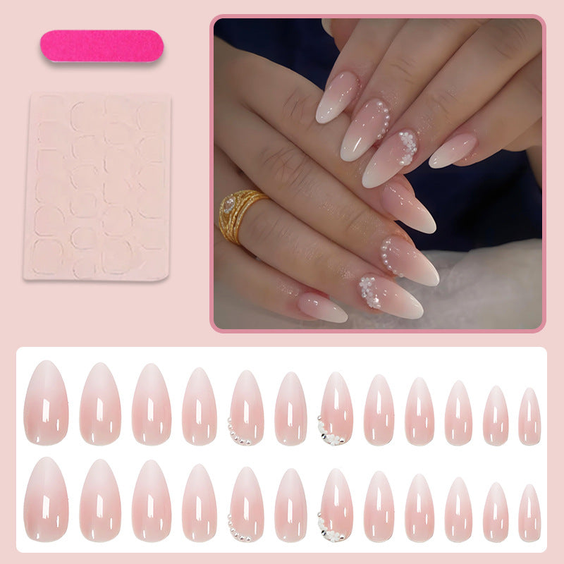 Kunstnagelset mit eleganten Ombre-Effekten und Glitzerakzenten Karnz