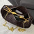 Damen Handtasche aus geflochtenem Material mit goldfarbenem Tragegriff Karnz