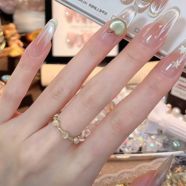Kunstnagelset mit eleganten Glitzer-Akzenten Karnz
