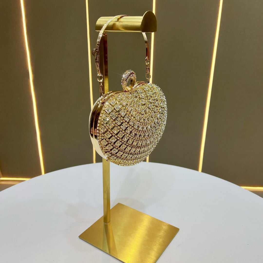 Herzförmige, kristallbesetzte Abendhandtasche