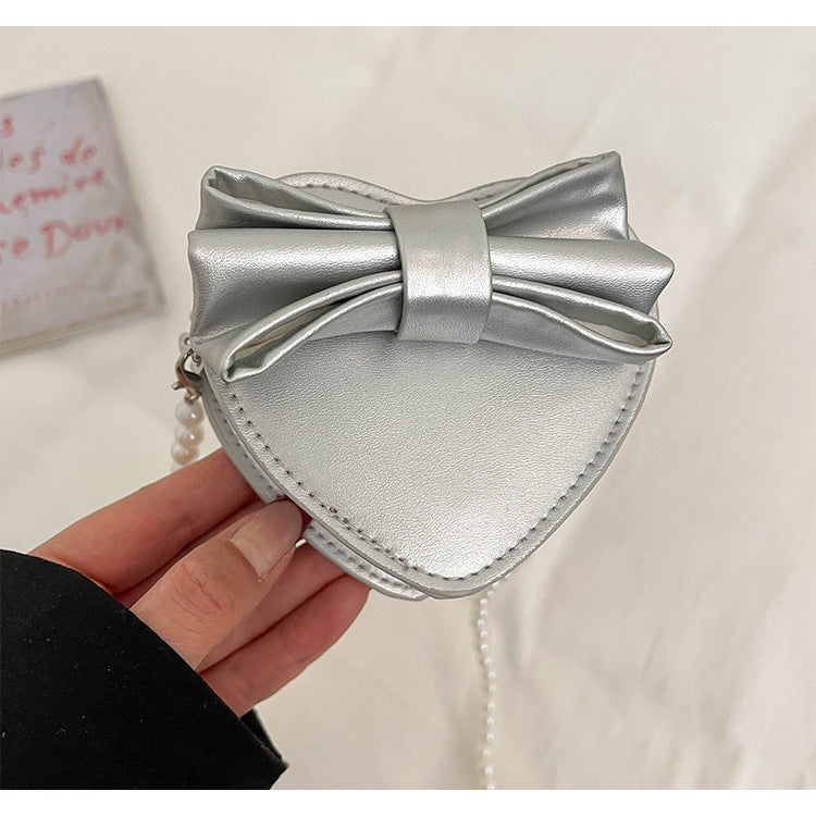 WoHerzförmige Schleifen-Clutch Tasche Karnz