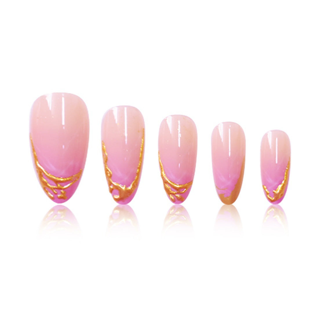 Elegante Stiletto Press-On Nagelerweiterungen mit goldenen Spitzenakzenten Karnz