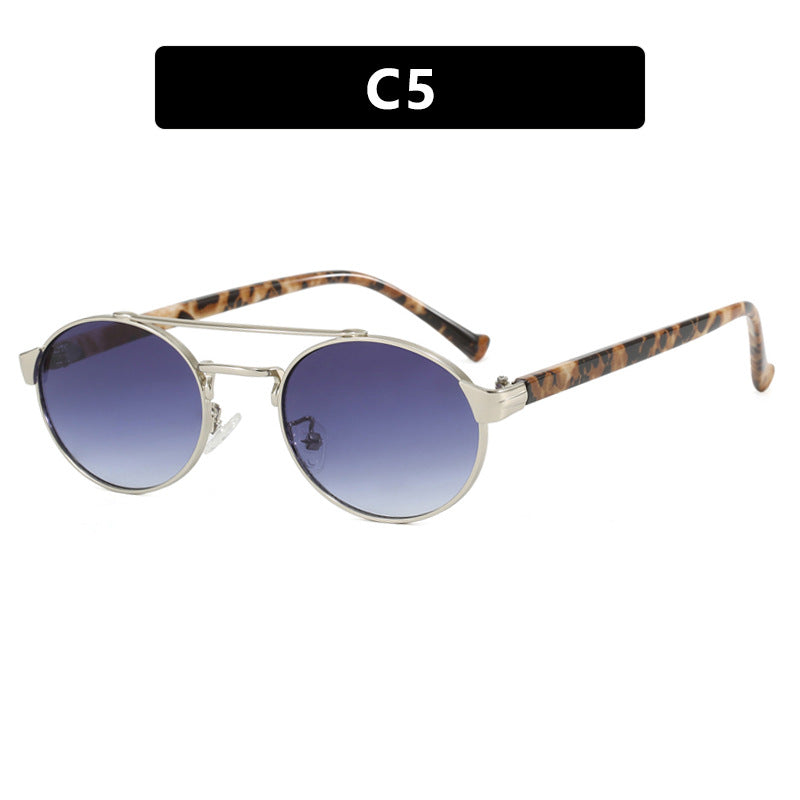 Damen modische Sonnenbrille im stilvollen runden Design mit goldenen Akzenten Karnz