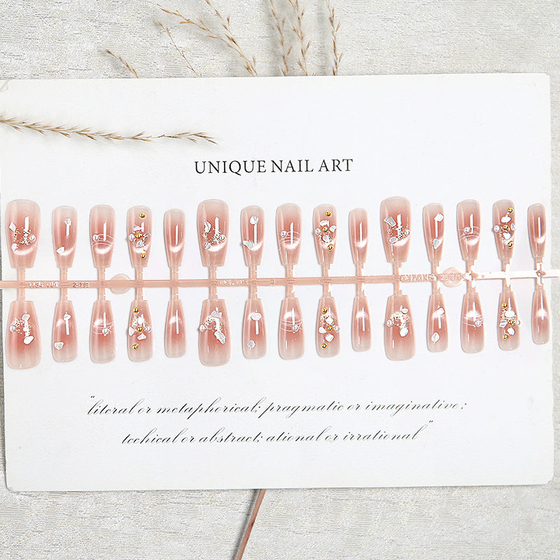 Kunstnagelset mit eleganten Glitzer- und Blumendekoren Karnz