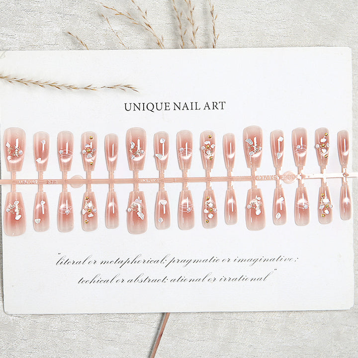 Kunstnagelset mit eleganten Glitzer- und Blumendekoren Karnz