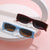 Damen modische Sonnenbrille mit asymmetrischem Rahmen und goldfarbenen Details Karnz