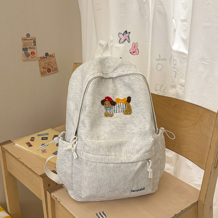 Verspielt bestickter Rucksack