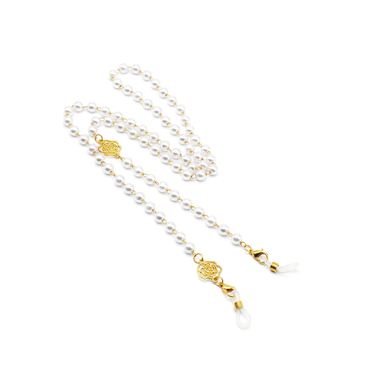Elegante Brillekette mit Perlen und Goldakzenten Karnz