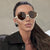Damen modische Sonnenbrille mit trendy sechseckigem Rahmen und schützenden Gläsern Karnz