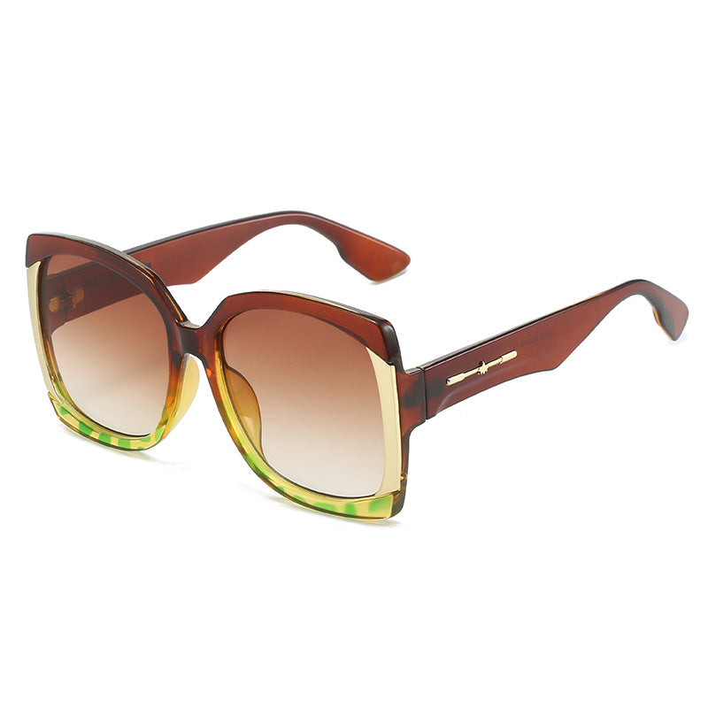 Übergroße Schildpatt-Sonnenbrille mit goldenen Akzenten Karnz