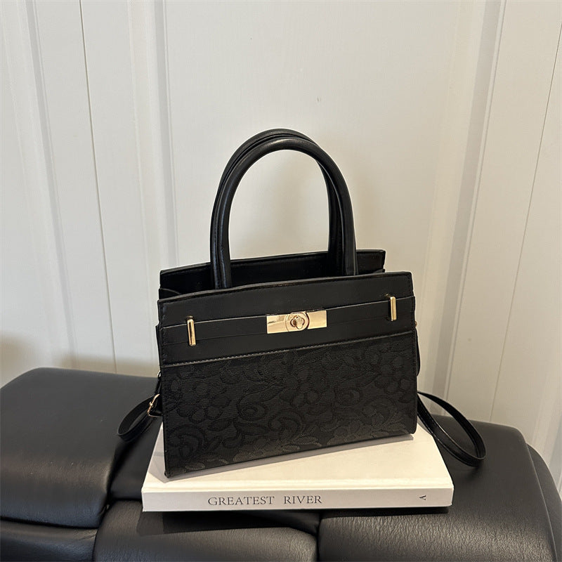 Elegante geprägte Handtasche